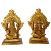 Laxmi And Ganesha Sitting On A Carving Throne